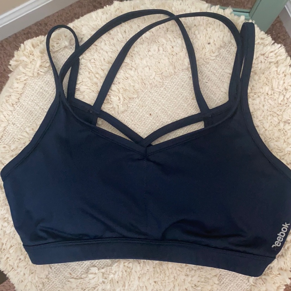 Padded sports bra. A bit In the cup size for me.